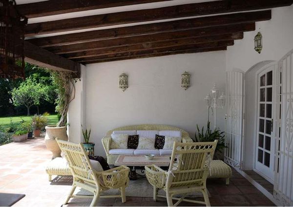 Andalusian Villa style.  Privacy, nature, gardens, lake views, beach is 5min.